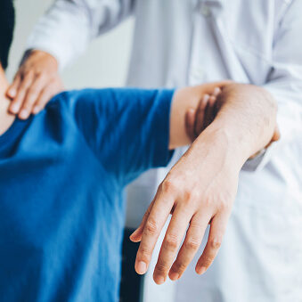 Physical Doctor consulting with patient About Shoulder muscule pain problems Physical therapy diagnosing concept